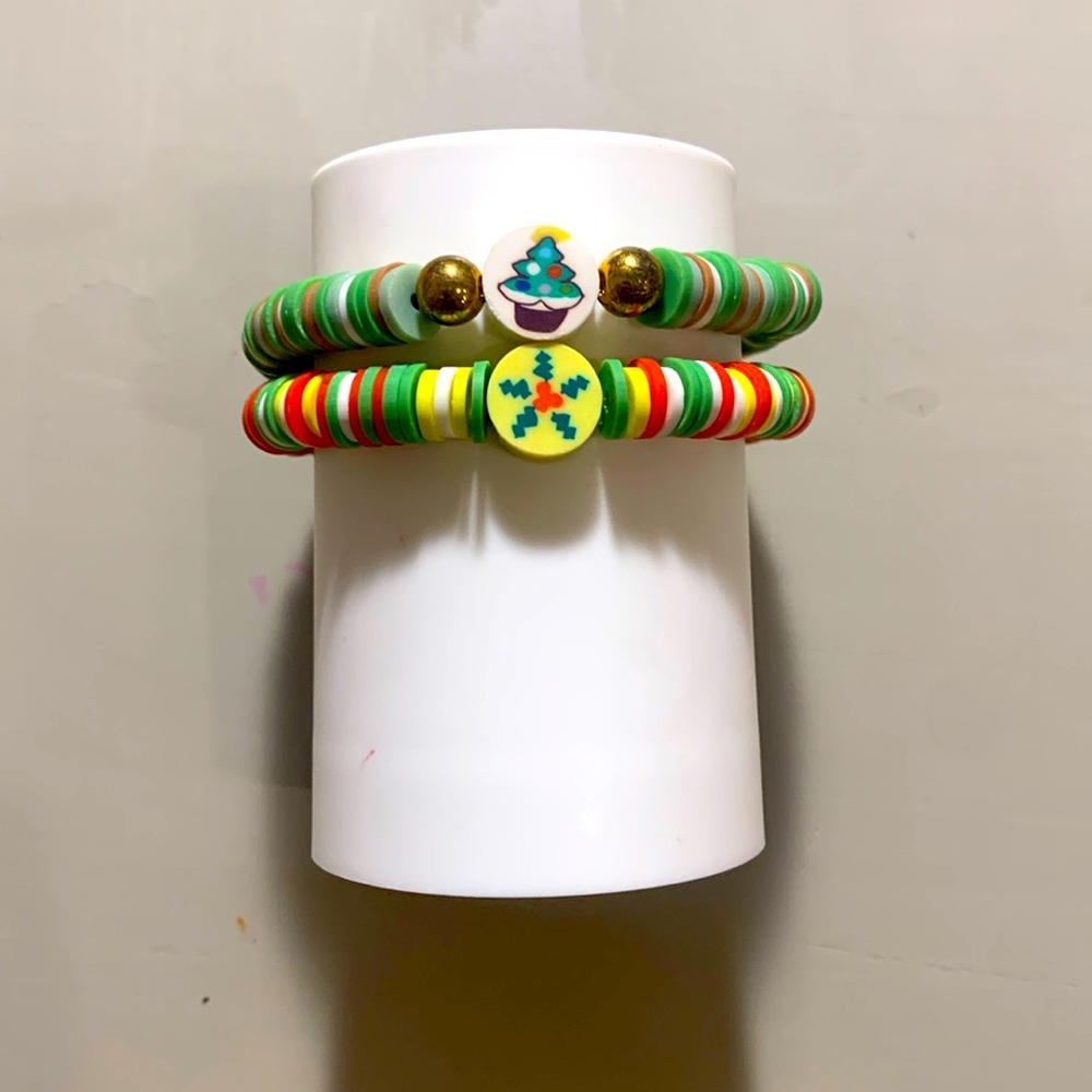 Two homemade clay Christmas bracelets